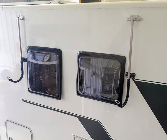 Surfboard rack for motorhome bodies